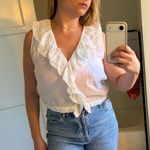 Dôen sleeveless linen ruffle top